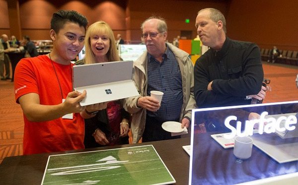 a microsoft employee showcases the surface tablet computer at the 2016 microsoft annual shareholders meeting held last nov 30 2016